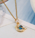 Collar Saturno con Estrellas